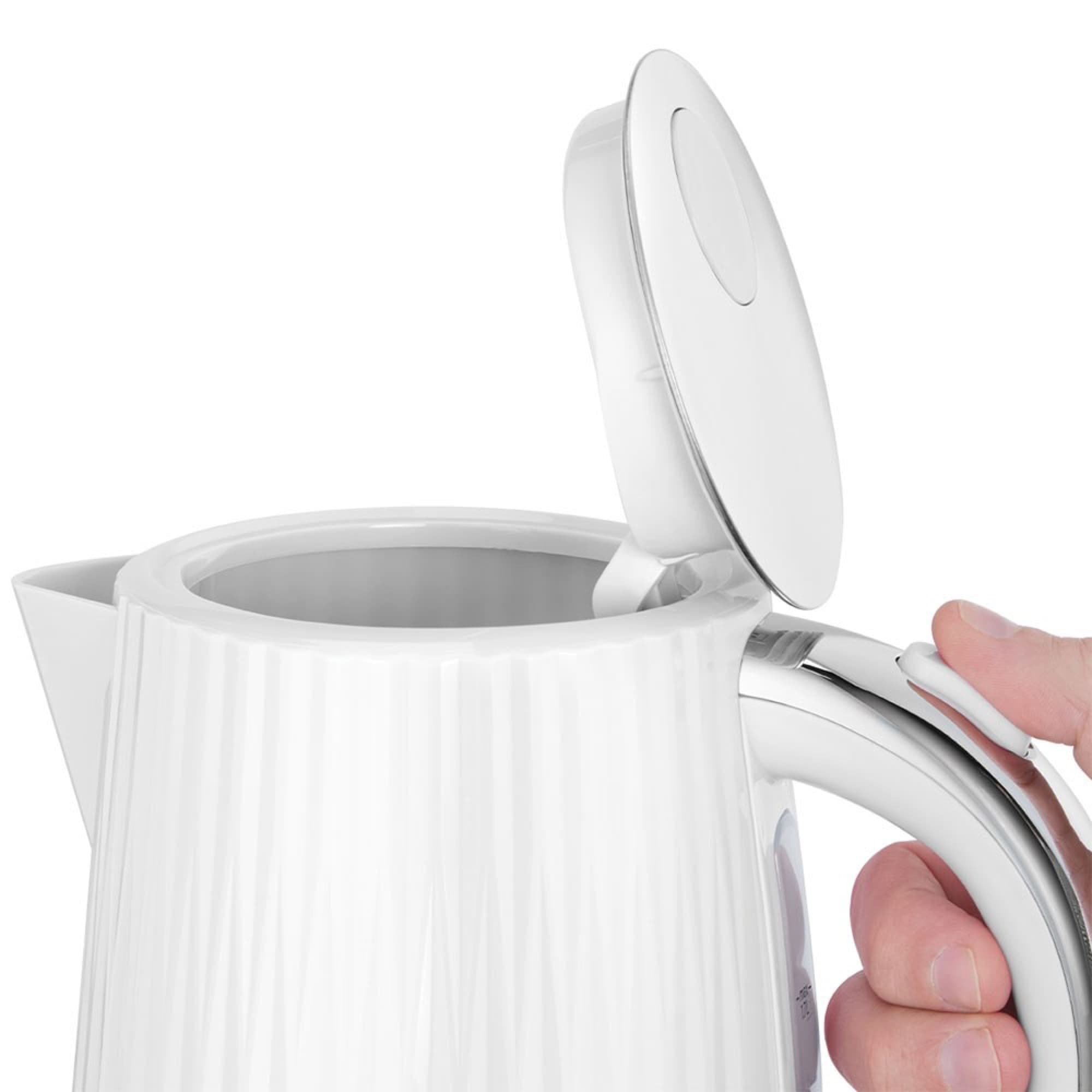 Locket öppnas med en knapp