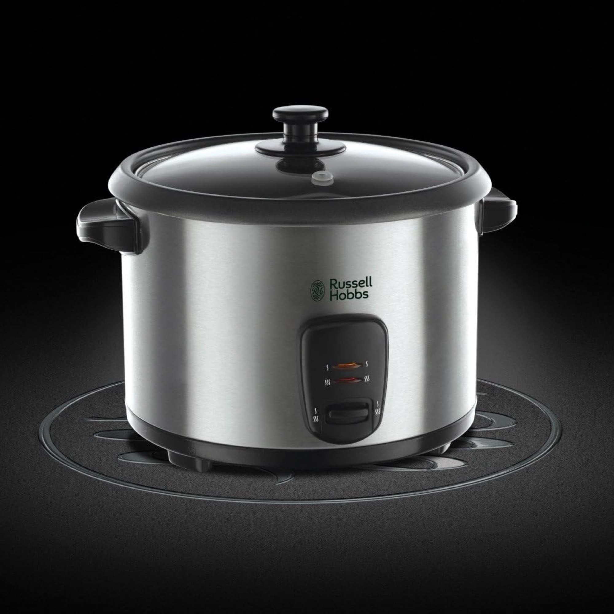The rice cooker on a black background