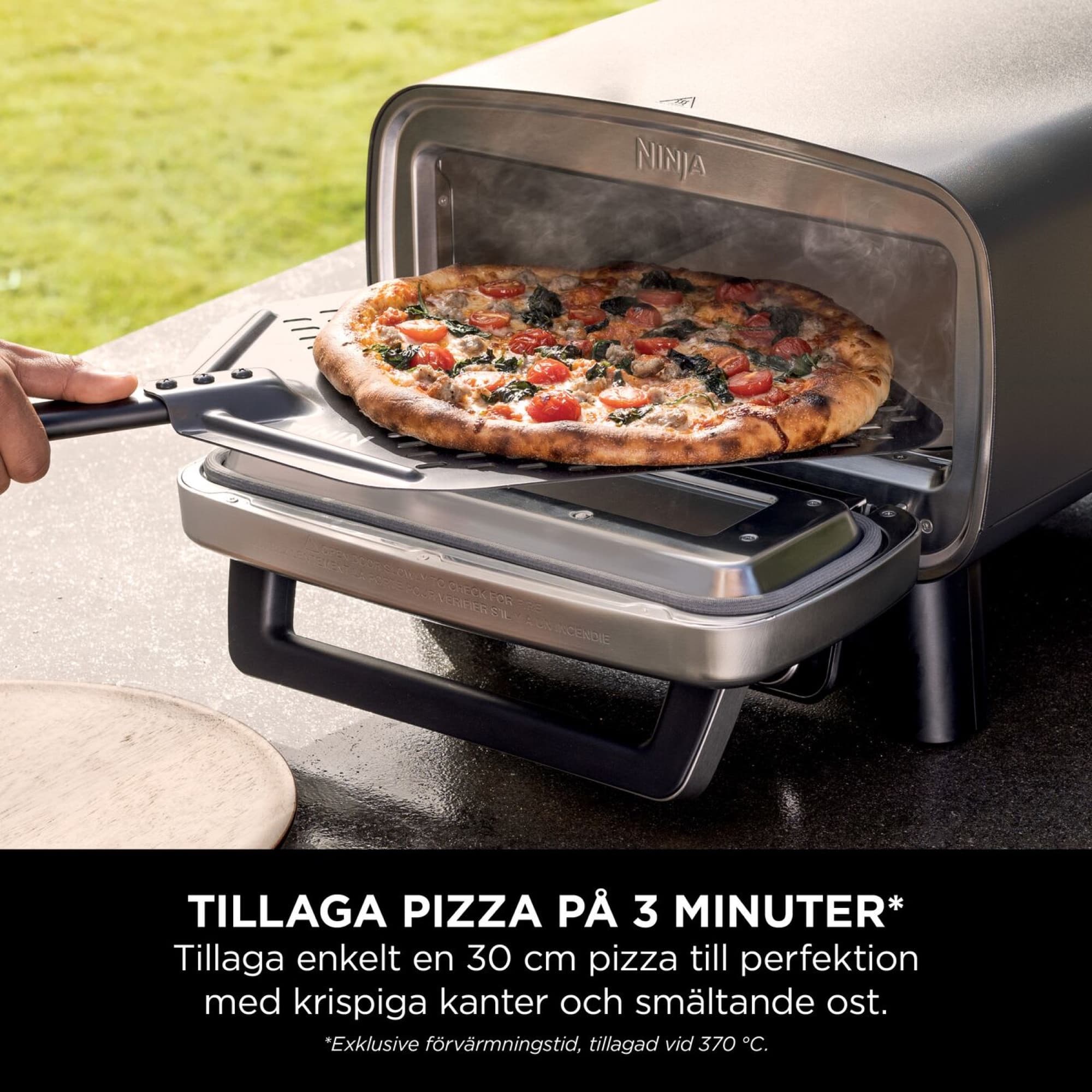 Pizza tas ut med pizzaspaden