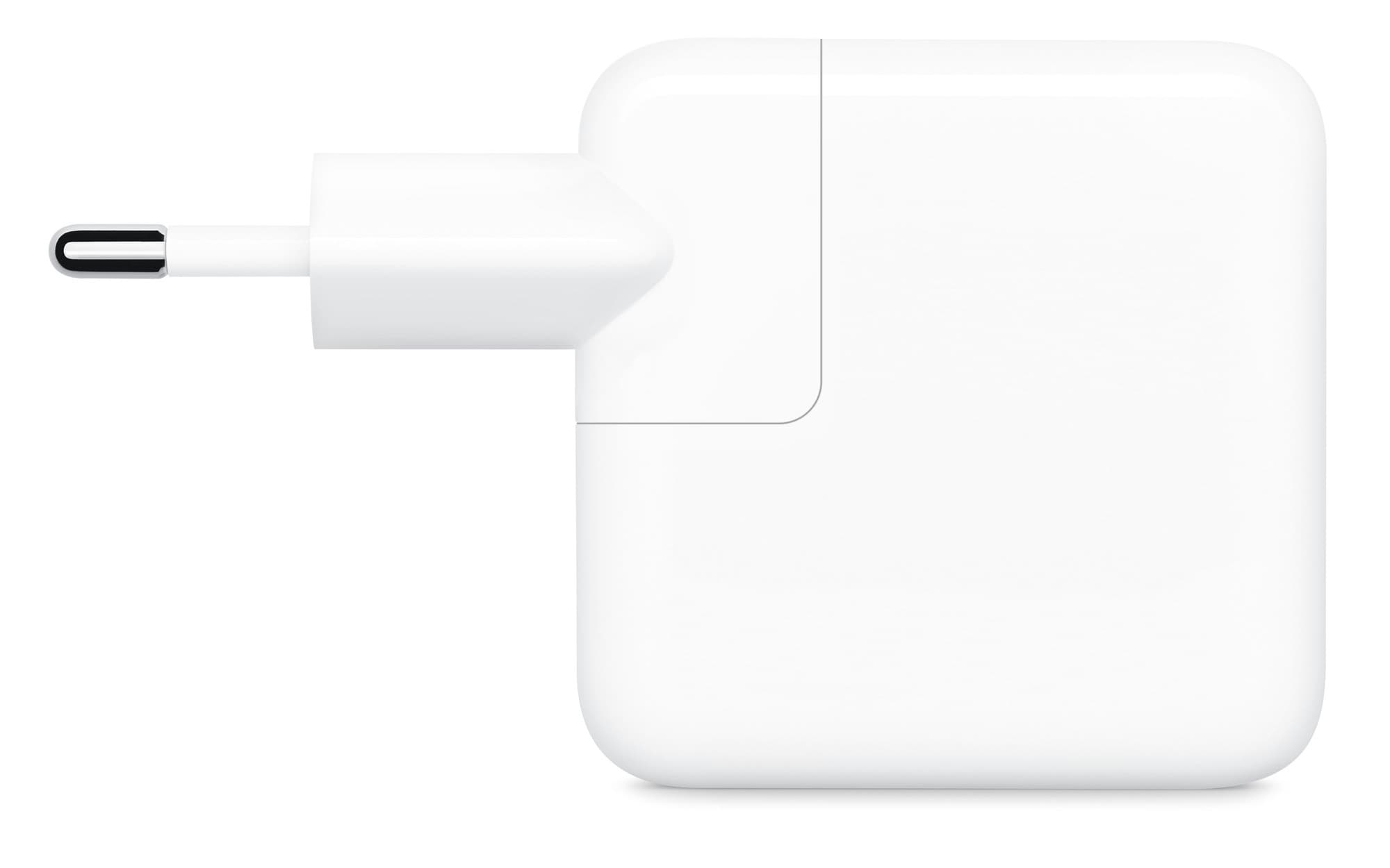 Adaptern med två portar med stickproppen