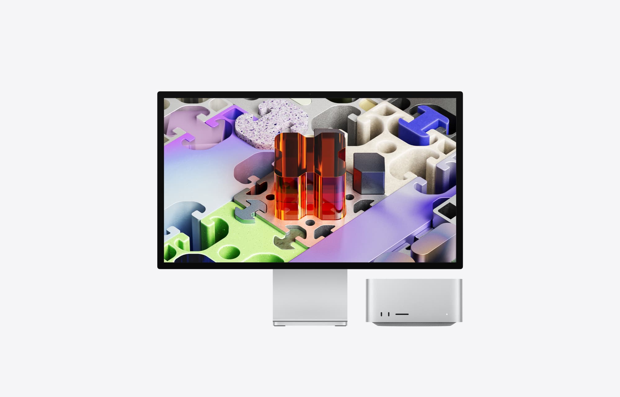 Mac Studio under en skärm