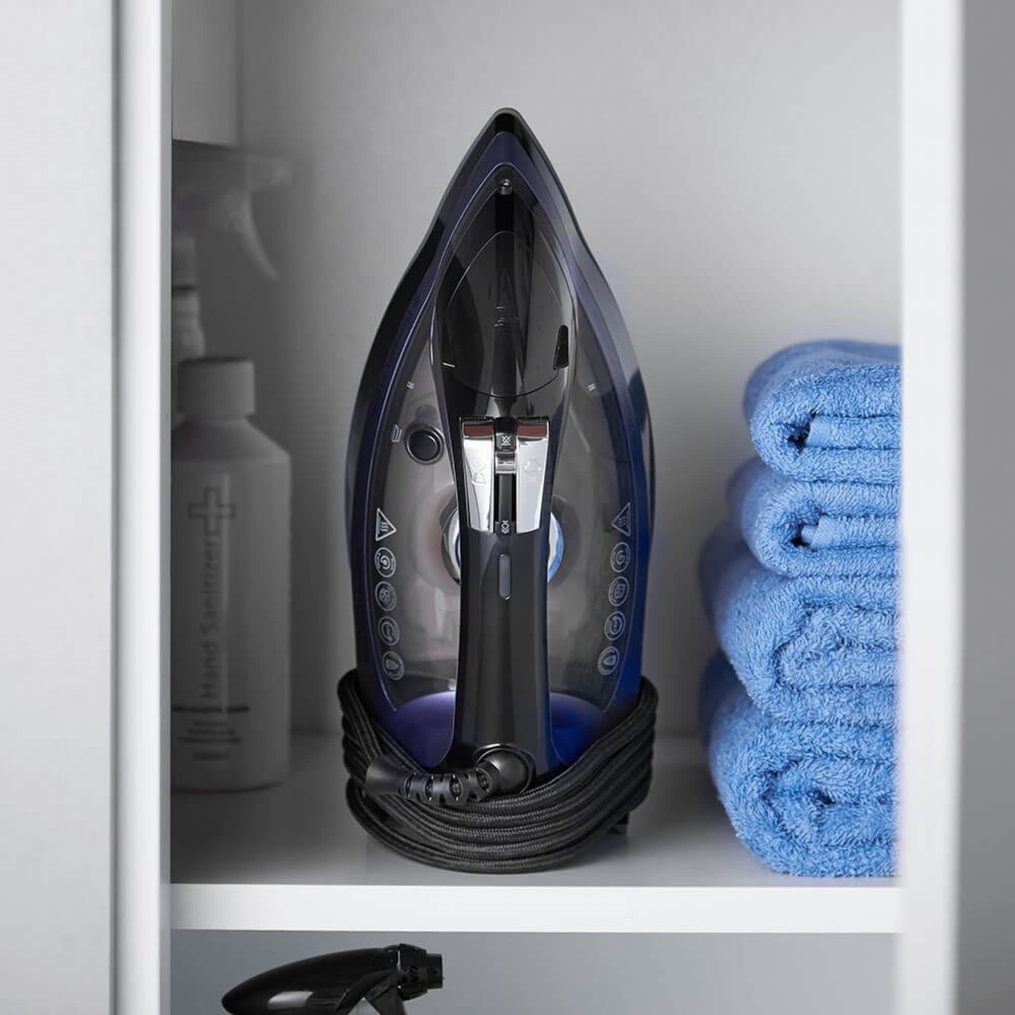 The iron stored in a cupboard