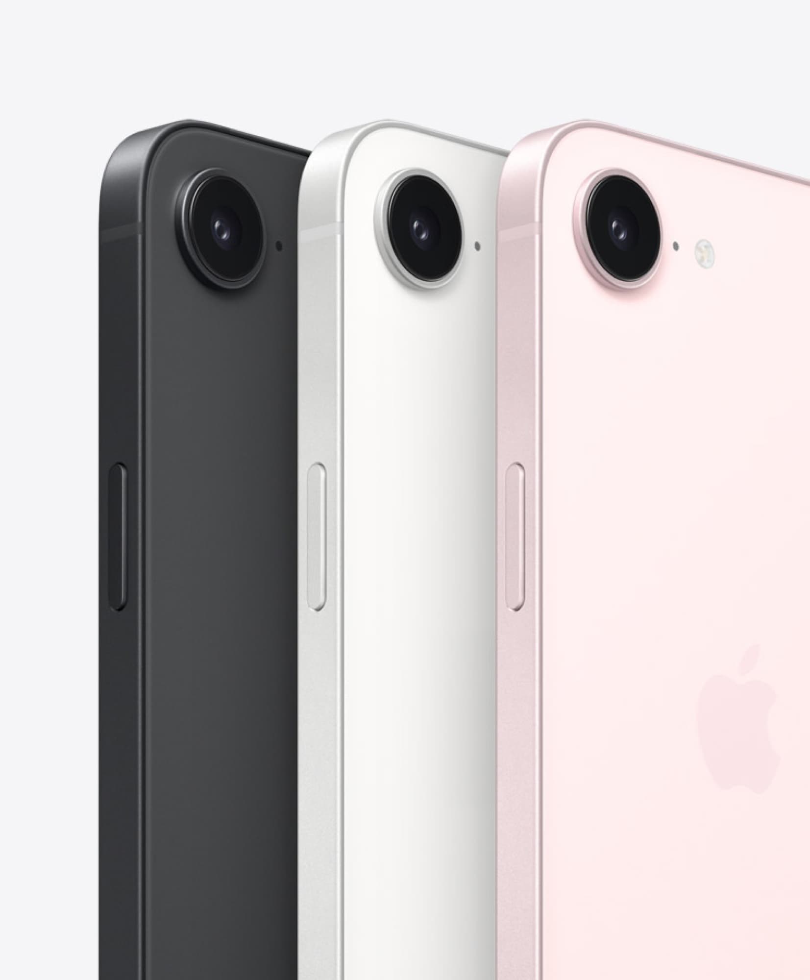 iPhone 17e i svart, vit och blekrosa bredvid varandra