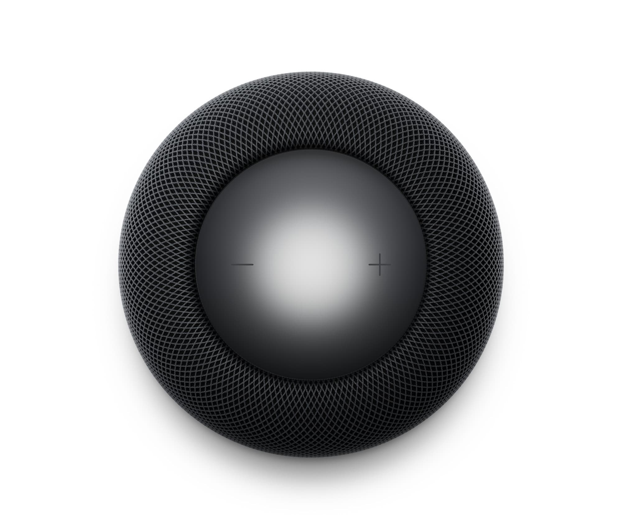 Touch-ytan på ovansidan av en HomePod i midnatt