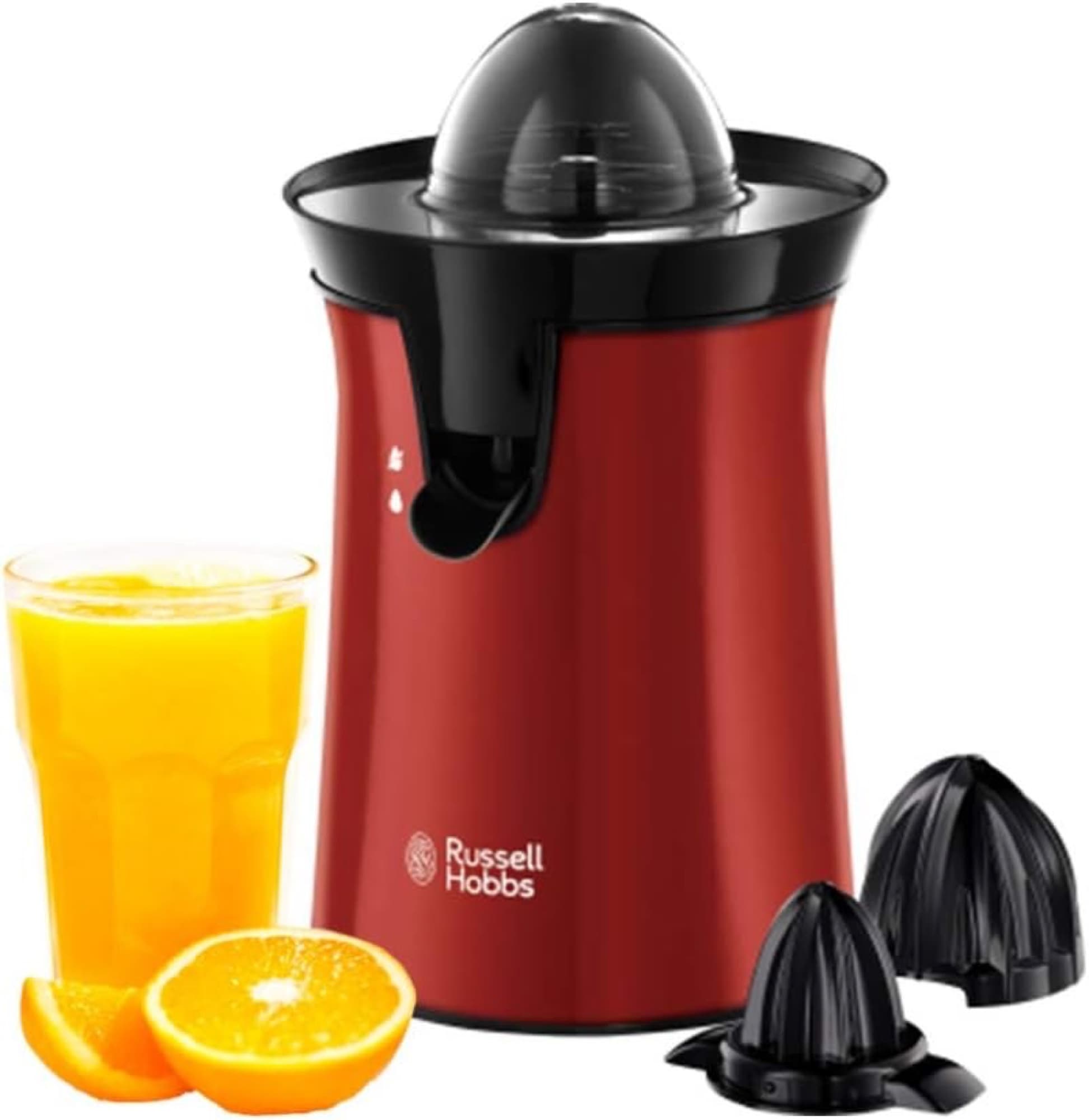 Citruspressen med apelsinjuice