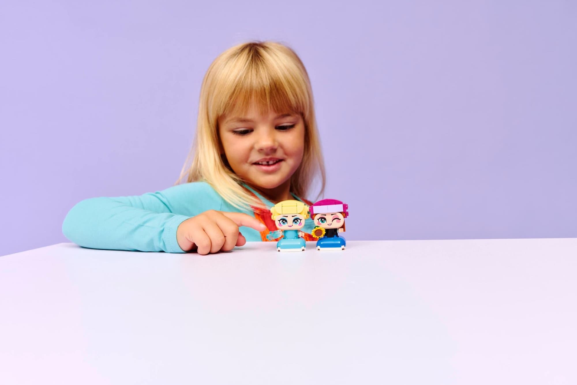 Mini Anna and Elsa being built and played with