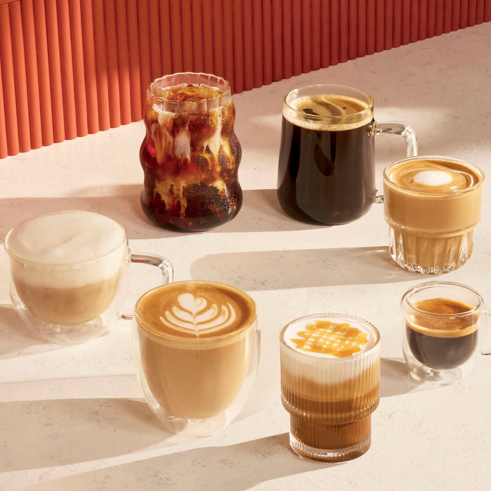 Iskaffe, latte och espresso i glas
