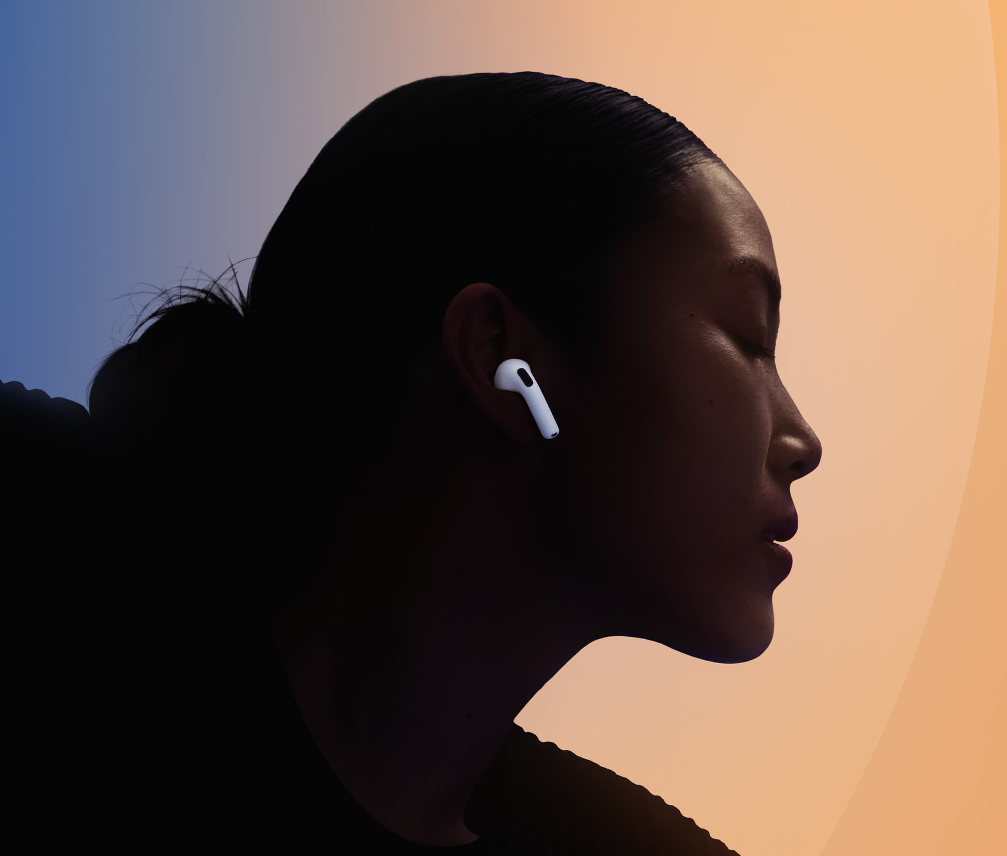 Profile of a person wearing AirPods 5