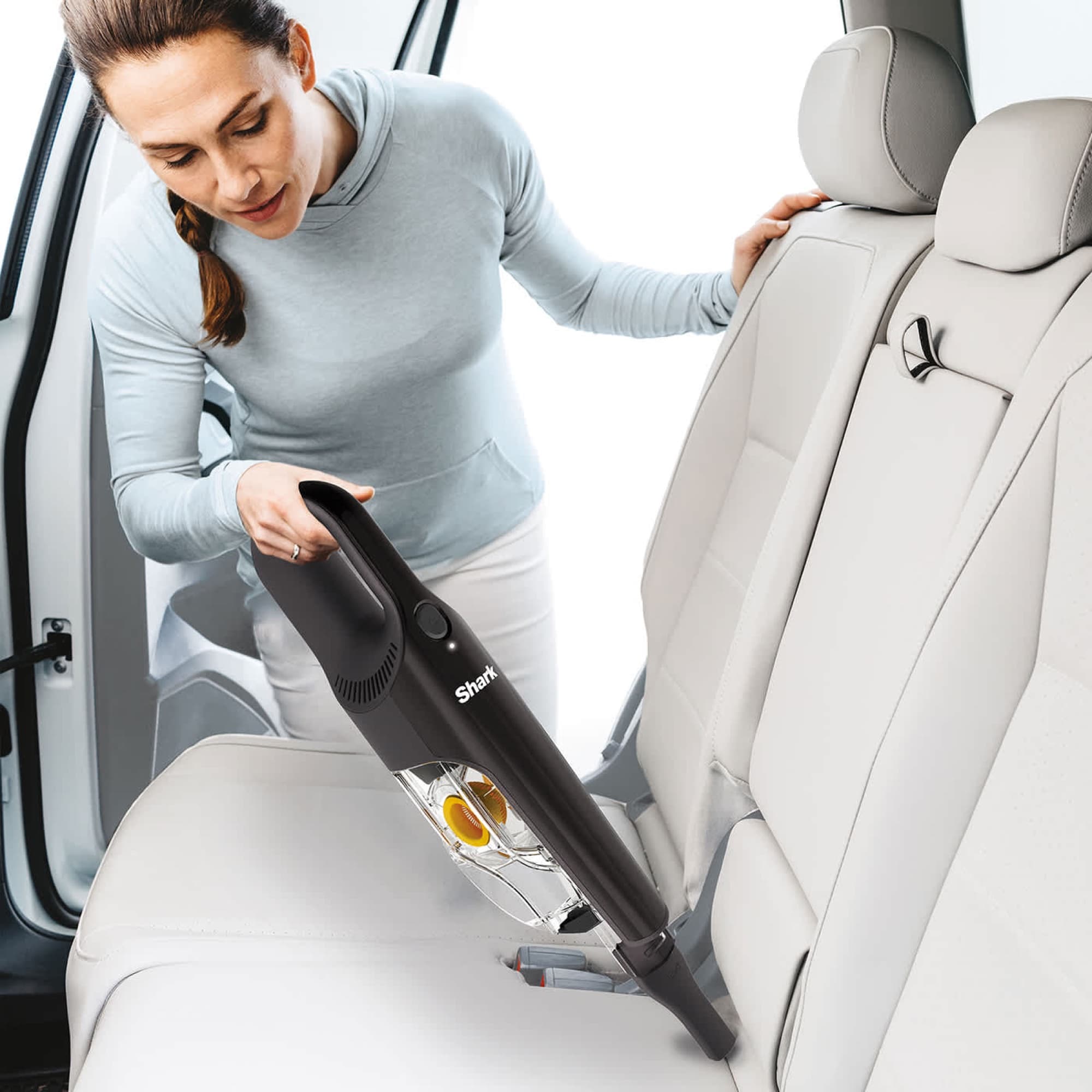 The handheld on the car's back seat