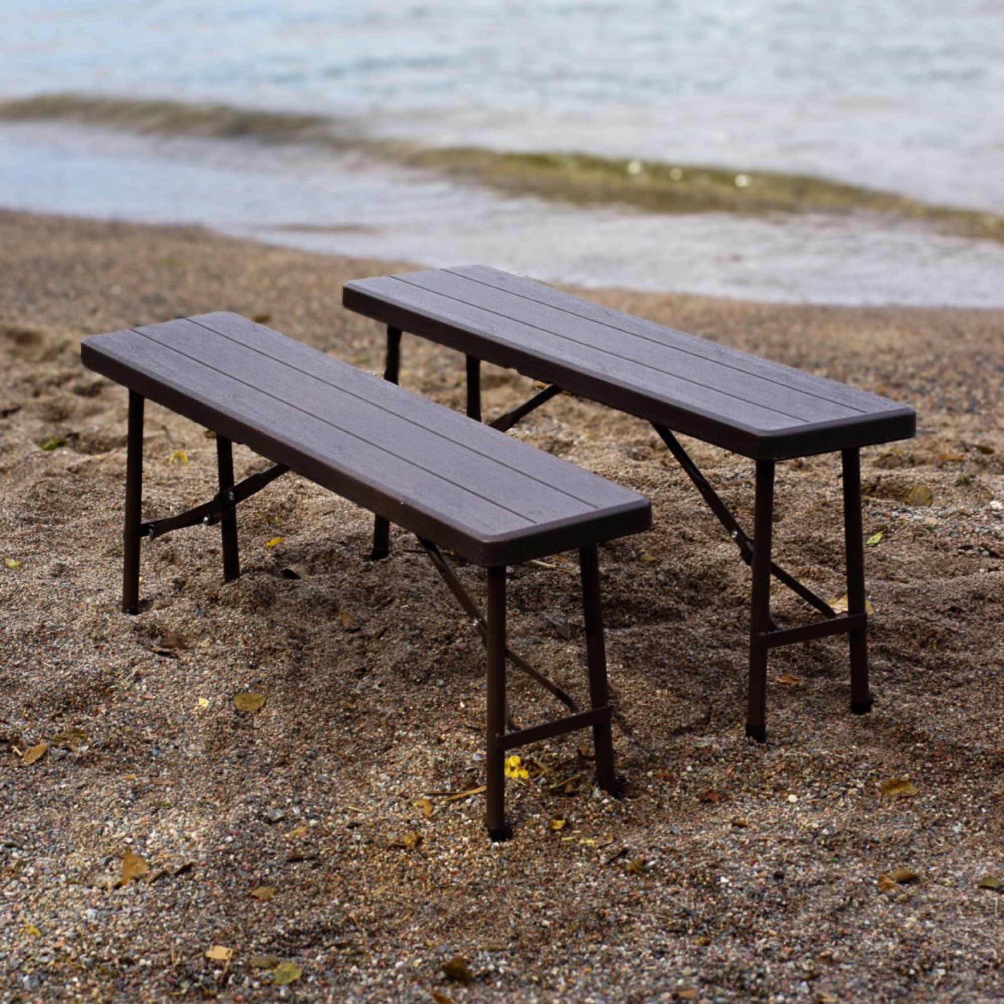 Two sauna benches on a beach