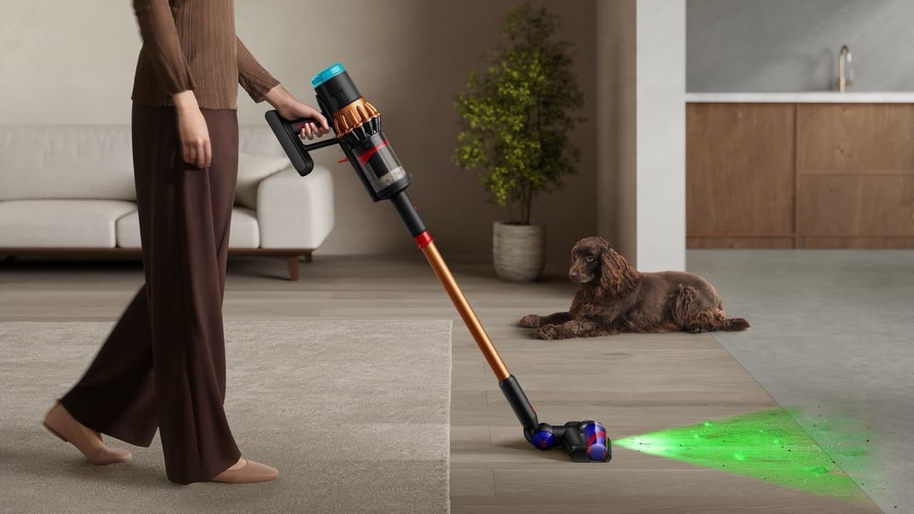 Vacuuming the living room with the dog nearby